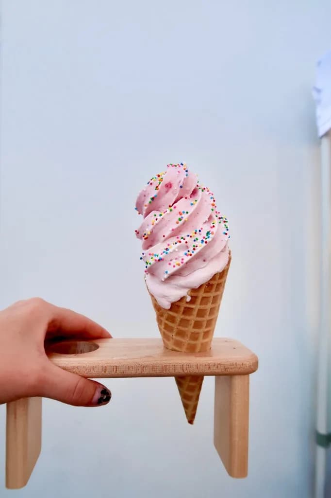 Real fruit ice cream cone with rainbow sprinkles